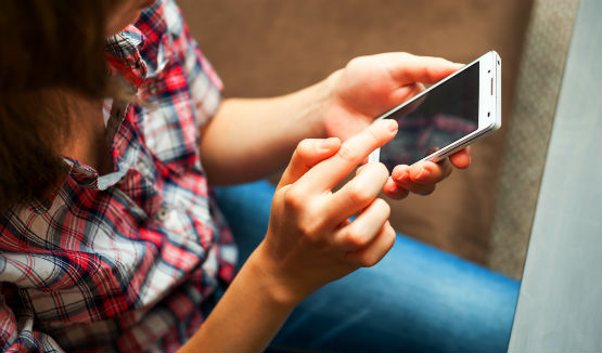 girl using cell phone